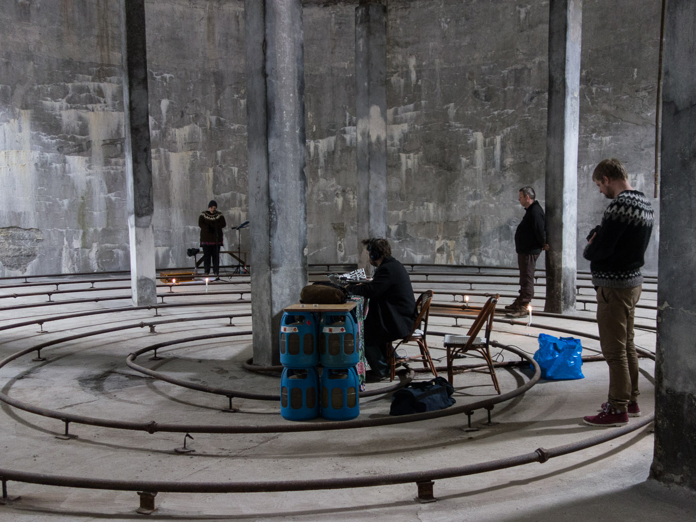 Djúpavík. Week 2. - ... to record songs by Anna Jonsdóttir (in the background) in a oil tank beside the herring factory. (2 June till 8 June 2014)